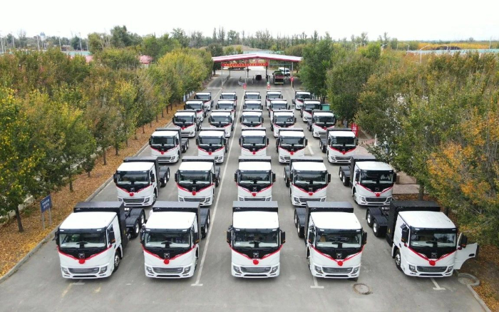 脱碳“换”绿举行时！！尊凯实业新能源重卡批量交付西北