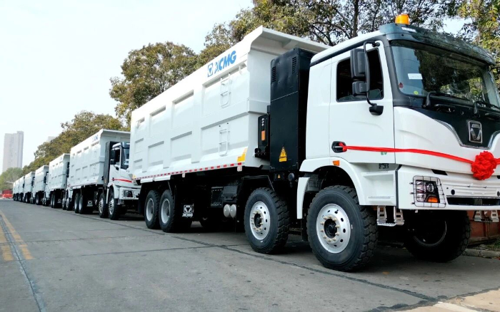 尊凯实业纯电动自卸车排队出海，助力外地煤炭运输绿色转型